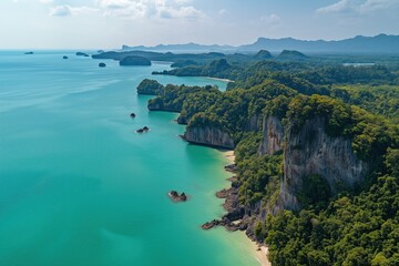 A beautiful view of a beach and ocean with mountains in the background
