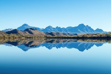 A beautiful mountain range with a lake in the foreground