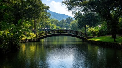Naklejka premium Charming riverside waterfront with a picturesque bridge surrounded by lush greenery and tranquil waters.