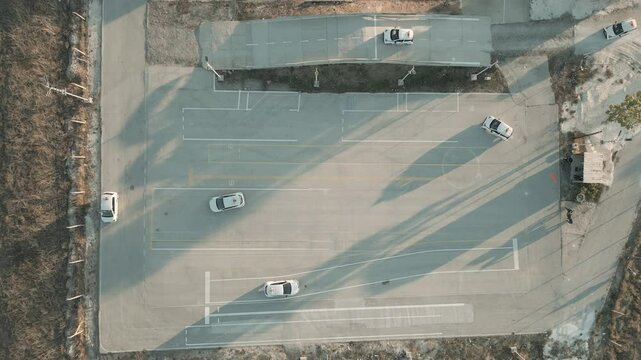 Cars practicing how to drive in a vehicle driving school. Getting a driving license.