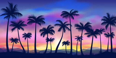 Silhouettes of palm trees at sunset