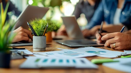 A group of business people having a meeting discussion on table