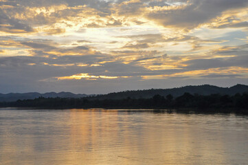 sunset over the maekong river