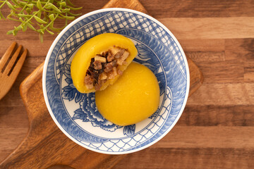 Sweet potato yam bun with ground pork meat, mushroom and chopped bamboo shoot fillings inside.