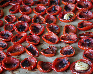 Delicious dried tomatoes on a baking sheet are ideal for any meal or holiday Tomatoes on a Baking Sheet Perfect for Any Meal or Occasion