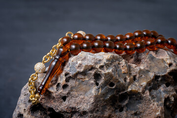 Ottoman-Turkish Amber Rosary , Traditional Islamic cultural representation , On a rock