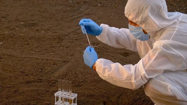 Taking soil samples in nature. Selective focus.
