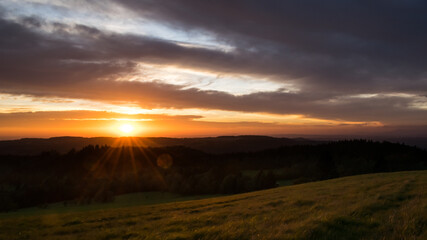 Obraz premium Sunset from Panský kopec in the Orlické Mountains and a view of the Czech landscape.