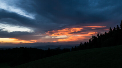 Obraz premium Sunset from Panský kopec in the Orlické Mountains and a view of the Czech landscape.