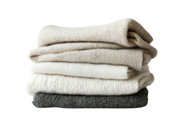 A stack of soft, cozy towels in neutral tones on a white background, perfect for home decor and relaxation themes.