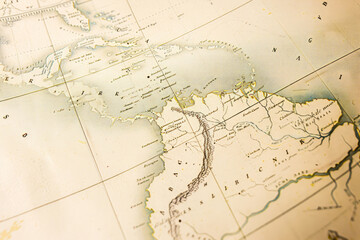 An antique map of the Caribbean region emphasizes its tropical allure and historical significance through detailed geographic features.