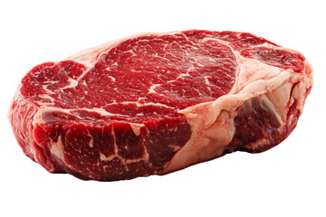 Obraz premium Raw ribeye steak with marbling, isolated on a white background.