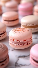 Fototapeta premium Colorful macarons in pastel hues, beautifully arranged on a marble surface, showcasing an array of delightful flavors and textures.