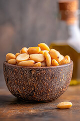 Healthy Snack in Rustic Wooden Bowl with Nutrient-Rich Nuts and Natural Oil