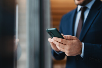 Close up images businessman using smartphone