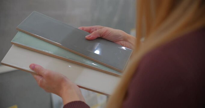 Designer Choosing Colorful Ceramic Tiles for Interior Project