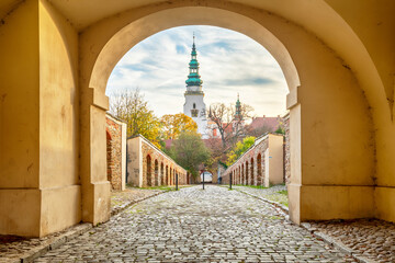 Abbey of Henrykow, Poland. View of bell tower throug an entrance arch