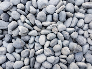 Small grey stones in close-up background texture,spa concept