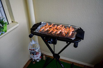 Shrimps cooked on a home grill