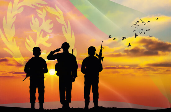 Silhouettes of soldiers with a background of the Eritrea flag and a sunset or sunrise. Concept of national holidays. Commemoration Day. - Powered by Adobe
