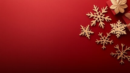 Golden snowflakes falling on a red background