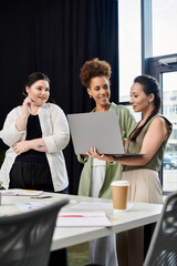 Three stylish businesswomen collaborate and share insights in a contemporary workspace.