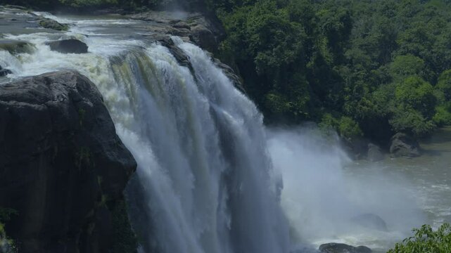 Close up view of Athirapally waterfalls in Kerala India, nayagra of India, river in the middle of rain forest kerala.