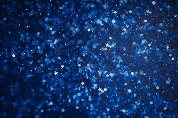 Abstract blue bokeh background. Defocused glitter lighting image for art and design.