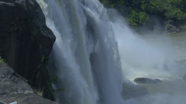 close up view of waterfall, Athirapally waterfalls in Kerala India, nayagra of India, river in the middle of rain forest kerala.