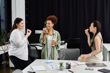 Businesswomen enjoy sweet moments together while discussing ideas in a stylish workspace.