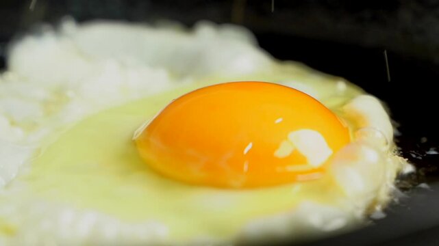 Nutritious breakfast fried eggs slow motion