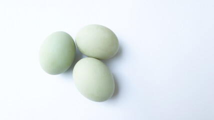 Raw duck eggs isolated on white background. Rich in protein nutrition.