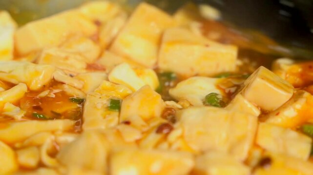 Sichuan cuisine mapo tofu stir fry slow motion