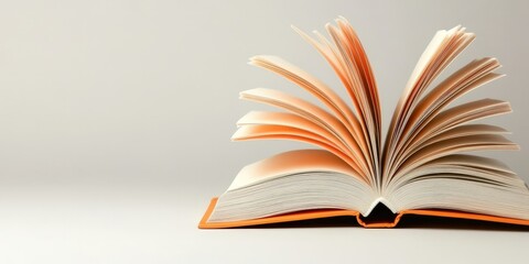 Open Book with Orange Cover on White Background   Education  Reading  Knowledge