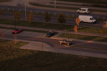 Top view of street and road with cars in the evening