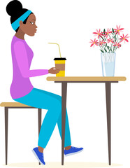 Nations and races. African American woman sitting at the table with a glass of coffee. Modern young fashionable woman with dark skin.