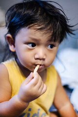 Child Eating French Fries