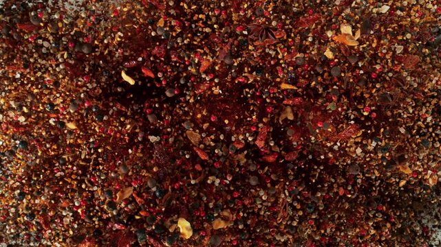 Super Slow Motion Shot Various Spices Mixture Exploding Towards Camera at 1000fps.