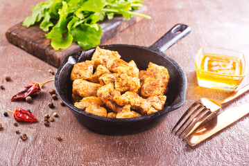 Fried chicken breast with spice and salt