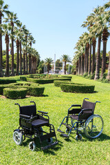 Empty wheelchair over green grass