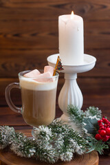 New Year's hot cappuccino drink with marshmallows. Festive atmosphere of New Year and Christmas