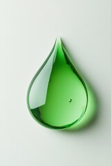 Green Water Drop on White Surface