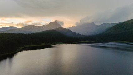 the lake is Bright at sunset, filmed from a drone