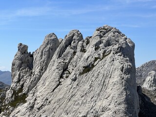 Rocky ridge of Tulove grede or karst mountain peak of Tulovice - Velebit Nature Park, Croatia (Stjenoviti greben Tulove grede ili krški planinski vrh Tulovice - Park prirode Velebit, Hrvatska)
