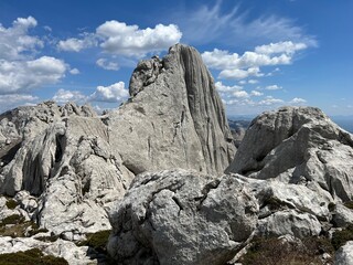 Rocky ridge of Tulove grede or karst mountain peak of Tulovice - Velebit Nature Park, Croatia (Stjenoviti greben Tulove grede ili krški planinski vrh Tulovice - Park prirode Velebit, Hrvatska)