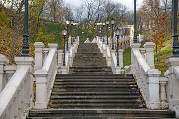 Cascade of stairs in the city park. Autumn view