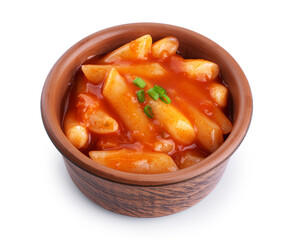 Tteokbokki rice cakes with chilli sauce and onion isolated on white background. Korean cuisine dish.
