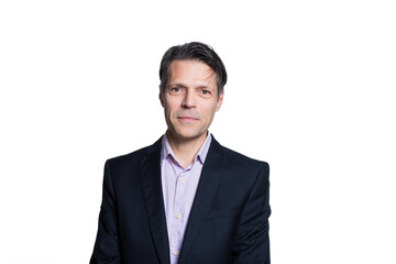 Middle-aged man smiling at the camera, on white background, wearing formal clothes.