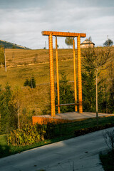 Autumn in the mountains.Wooden houses in the autumn mountains.The most picturesque place in the mountains.Autumn landscape of houses in the mountains.Autumn concept