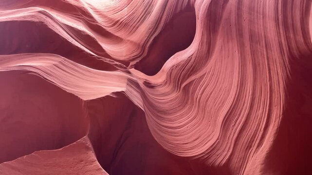 Wander through the breathtaking pathways of Antelope Canyon, experiencing the warm afternoon light illuminating the intricate sandstone formations and captivating textures.